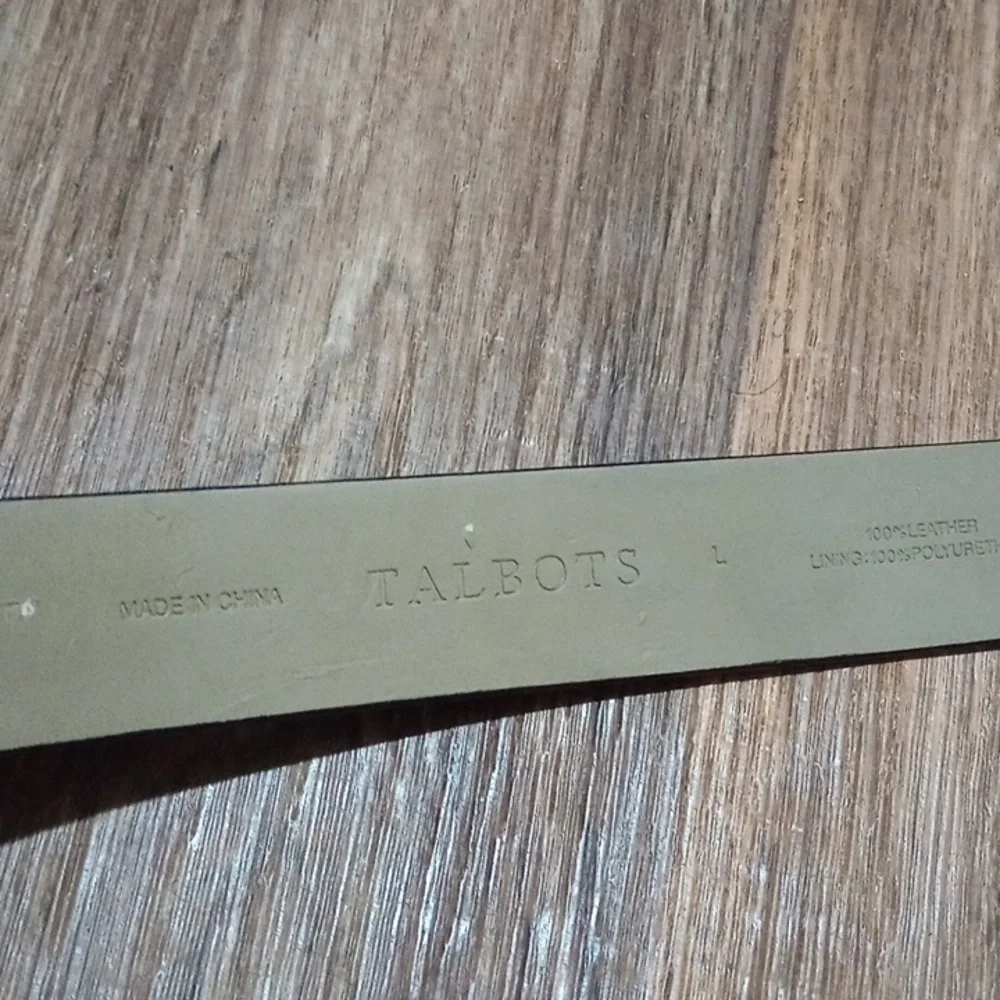 Talbots black leather belt has black & gold buckle  can be worn for any occasion